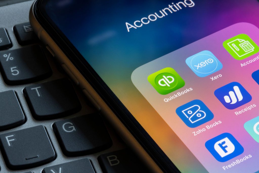 accounting software on phone and laptop