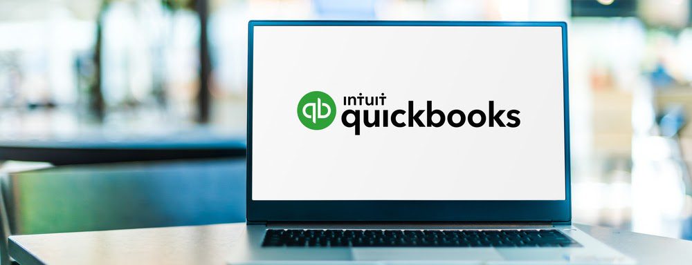 QuickBooks logo displayed on a laptop screen