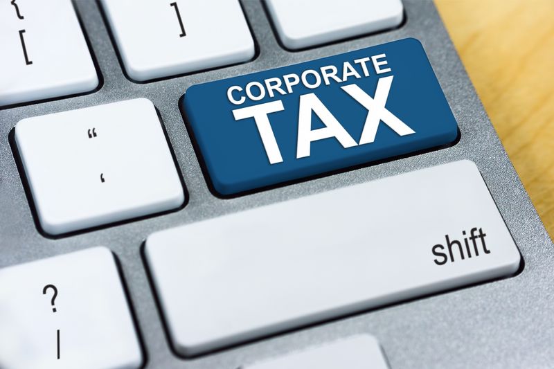 corporate income tax - Enter button of a keyboard replaced with the phrase Corporate Tax