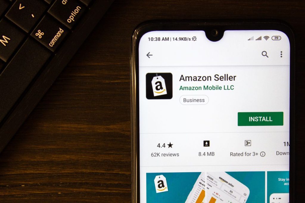 how much does amazon charge to sell - Smartphone with Amazon Seller app on screen